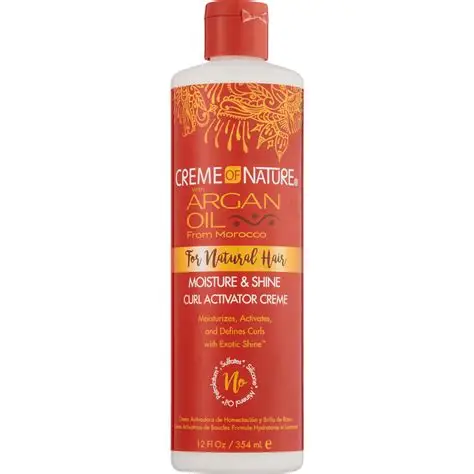 Creme_Of_Nature___leo_De_Argan_Umidade_E_Brilho_Ativador_De_Cachos_354Ml_12Oz_img_19_08_2025_21_56_26 Creme of Nature Óleo de Argan Umidade e Brilho Ativador de Cachos 355ml (12oz) - Image 1